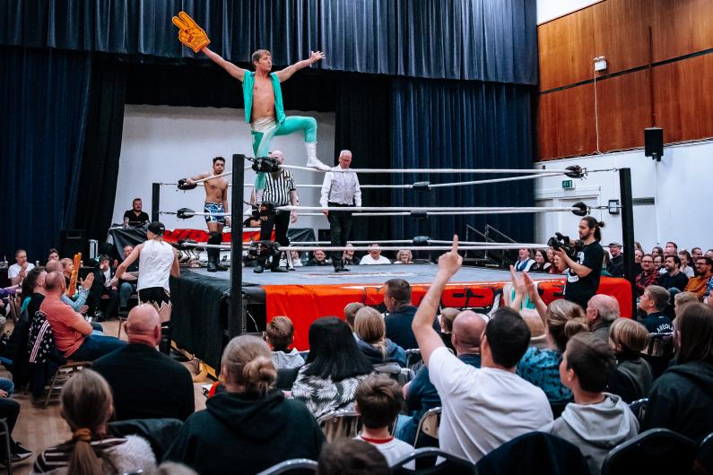 Wrestler in the ring at the Mill
