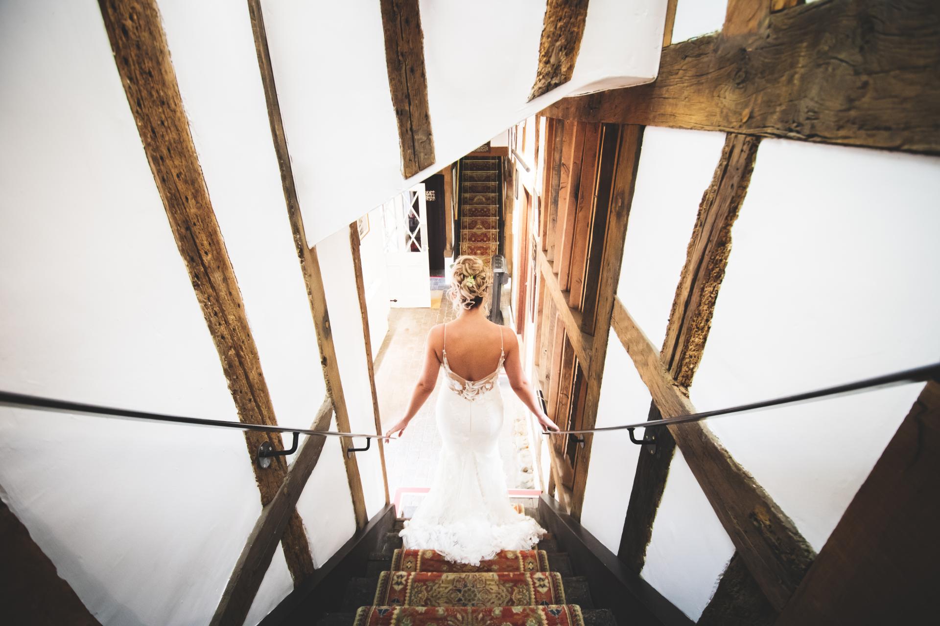 Bride coming down stairs