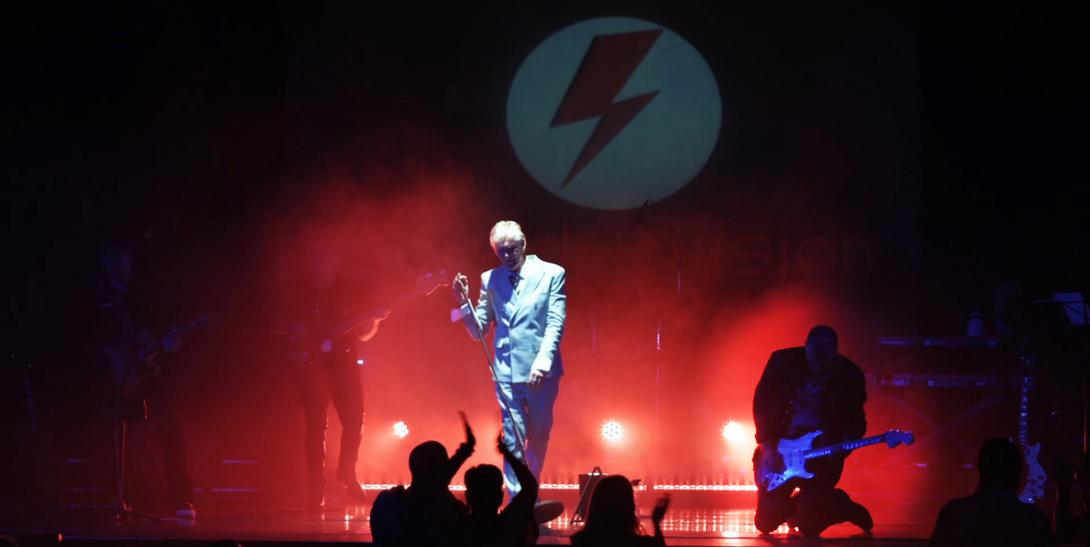 Photo of the band with all their lighting on the stage